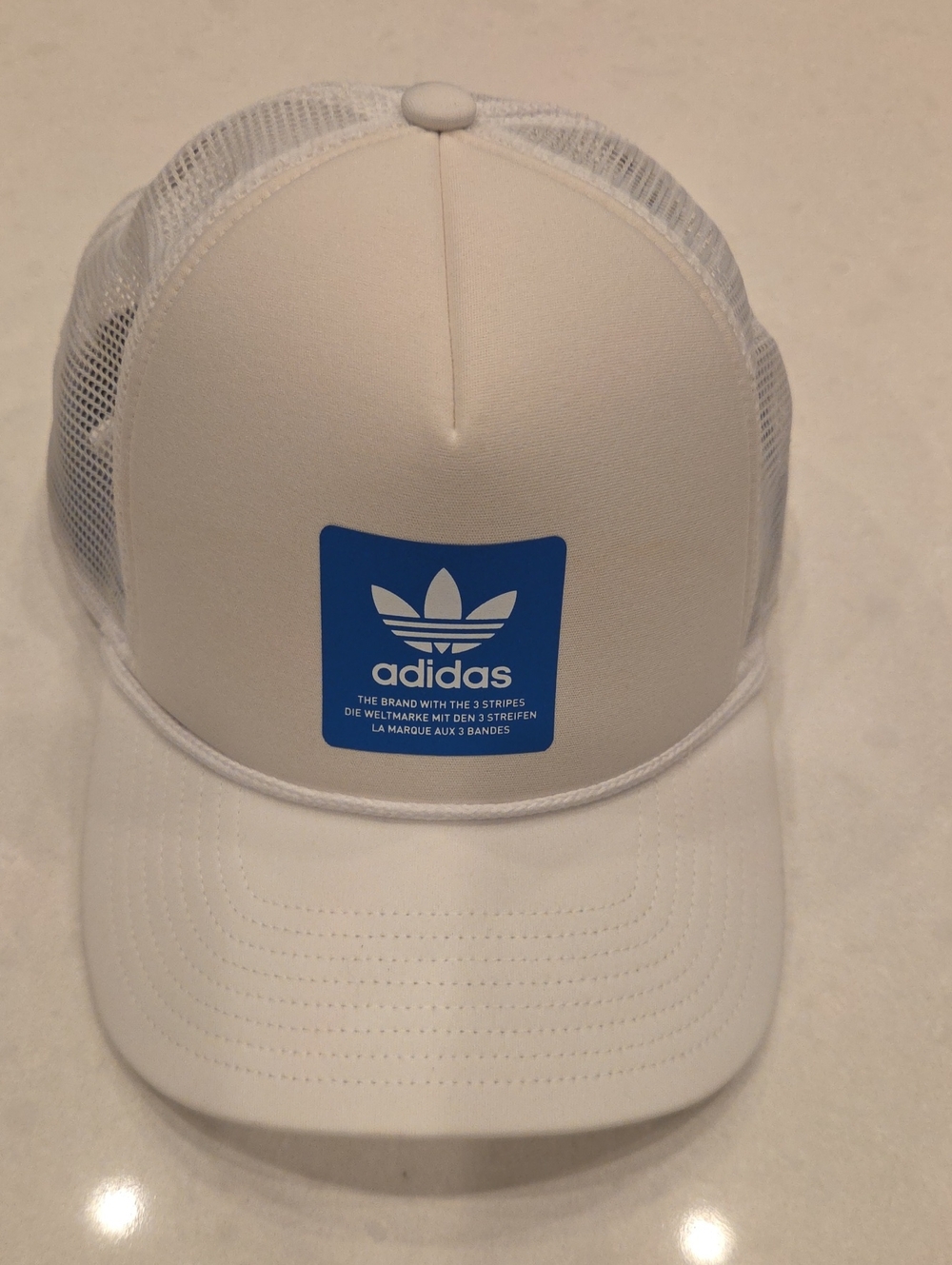 adidas White Trucker Hat with Blue Trefoil Patch